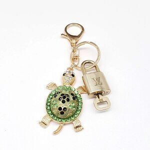 Authentic Louis Vuitton Lock & Key with unbranded Turtle Bagcharm 012026